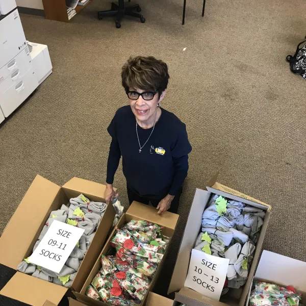 Women of Steel Chairperson Josie Garo - Preparing for the delivery of care bags for the Loma Linda Veterans Hospital