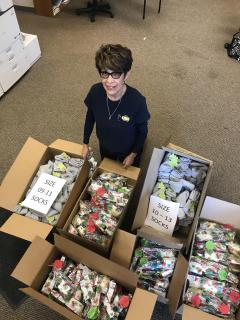 Women of Steel Chairperson Josie Garo - Preparing for the delivery of care bags for the Loma Linda Veterans Hospital